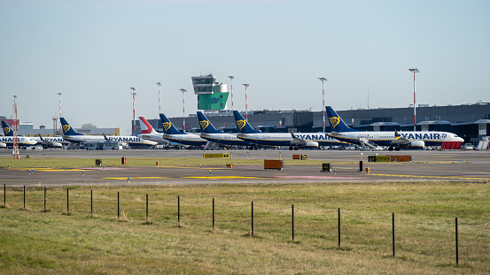 Bergamo, Italy. The Milan Bergamo international airport. View of the airport of the gates side. Airplanes at the gates