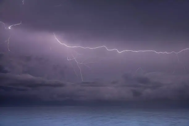 Nightshot of lightningstorm over the mediterranean sea near Peniscola, Spain