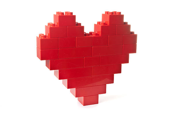 istock Heart shaped red building blocks on white background 186164701