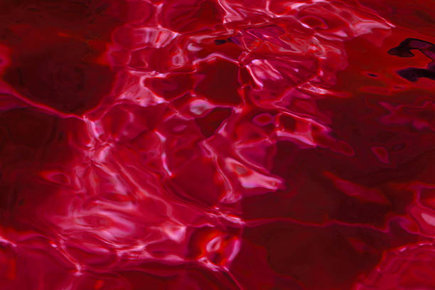 istock red abstract background of water surface 186165253