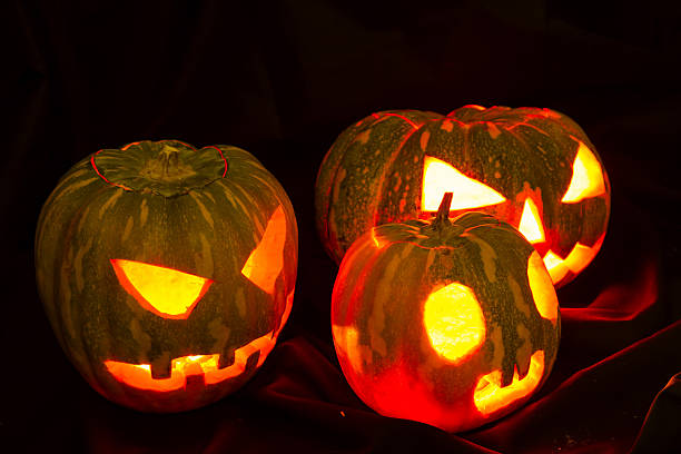istock Halloween pumpkins in the dark 186165393