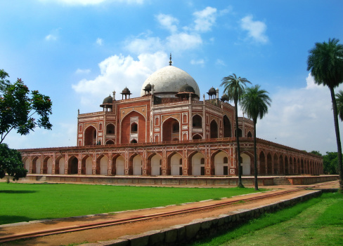 Delhi: Humayun's tomb, masterpiece of early Mughal architecture, and tomb of second Mughal Emperor Humayun. Started in 1562 by his wife, it's the predecessor / inspiration for Taj Mahal. IndiaDelhi: Humayun's tomb, masterpiece of early Mughal architecture, and tomb of second Mughal Emperor Humayun. Started in 1562 by his wife, it's the predecessor / inspiration for Taj Mahal. India
