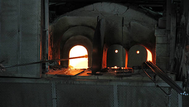 istock furnace lit with powerful flame for melting glass 186165615