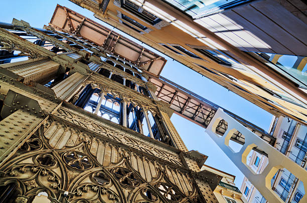 historical elevator Santa Justa in Lisbon historical elevator Santa Justa in Lisbon, Portugal, in a low angle view santa justa lift portugal stock pictures, royalty-free photos & images