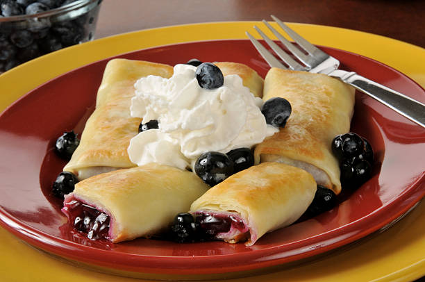 istock Blueberry blintzes with shipped cream 186175609