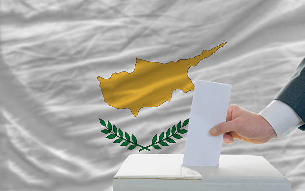 man voting on elections in cyprus stock photo