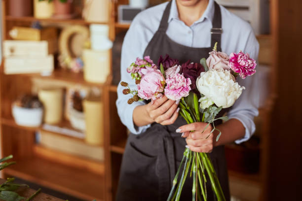 istock Florist with fresh pink bouquet 1861811050