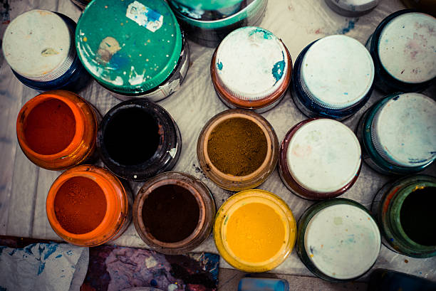istock colored jars of powder paint 186181789