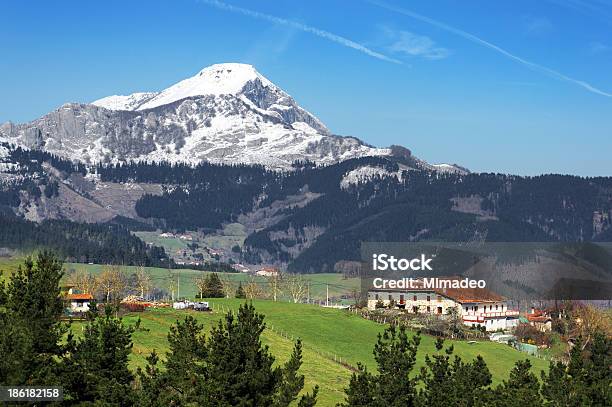 Village In Aramaio Valley With Snowy Mountains Basque Country Stock Photo - Download Image Now