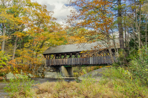 A covered bridge in Maine and autumn colours