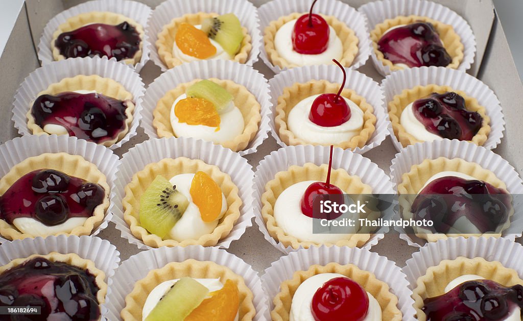 Fruit Tarts Rows of fresh fruit tarts Cake Stock Photo