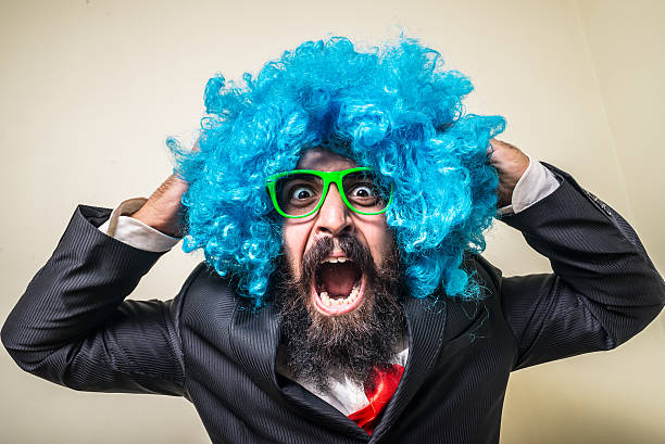 istock crazy funny bearded man with blue wig 186183227