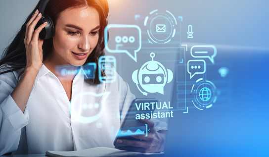 Smiling businesswoman in headphones working with phone and AI chat bot. Hologram hud with speech bubbles and icons. Concept of virtual assistant and video conference
