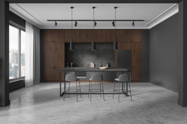 istock Gray and wooden kitchen interior with dining table 1861853140