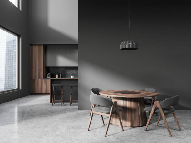 istock Grey kitchen interior with dining table, partition and bar counter near window 1861853644
