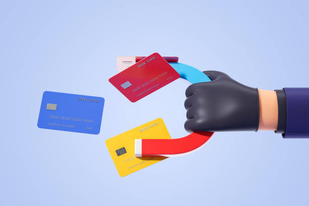 istock Thief hand with magnet and credit cards 1861854151