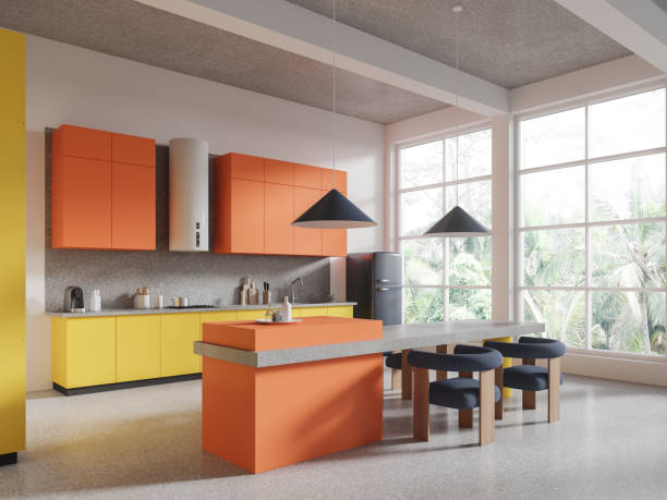 istock Colorful hotel kitchen interior with eating table, cooking corner and window 1861855187