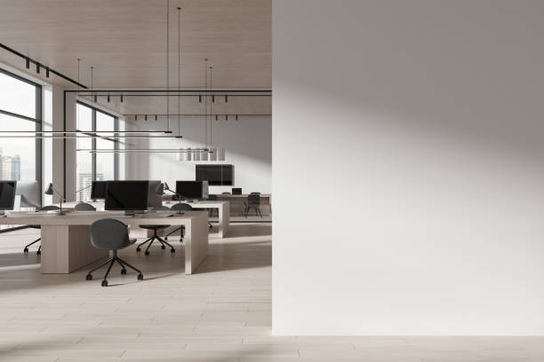 istock White coworking interior with work and meeting zone, window. Mock up wall 1861859297