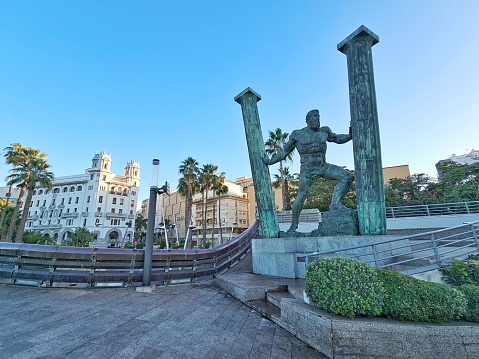 Ceuta, Spain. December 10, 2023:   Sculpture of The Pillars of Hercules: Abyla and Calpe, Ceuta, Spain. The scultpure is a work of Ginés Serrán Pagán and dates from 2007. It's 7 metres (23 ft) and 4 tons heavy