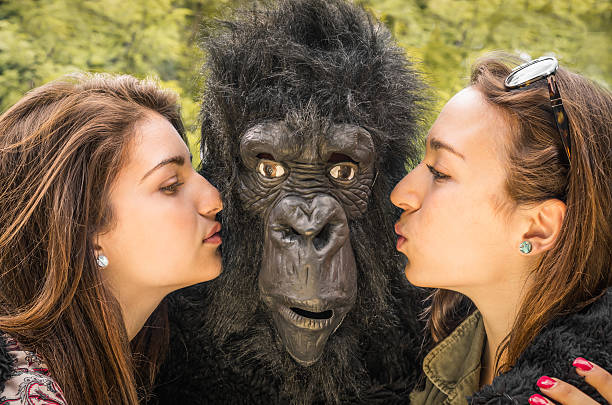 two-girls-kissing-an-astonished-gorilla.jpg