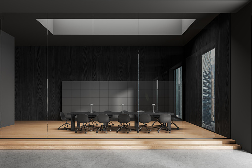 Modern glass meeting interior with chairs and board. Dark minimalist conference room and business hallway with stairs podium, panoramic window on skyscrapers. 3D rendering