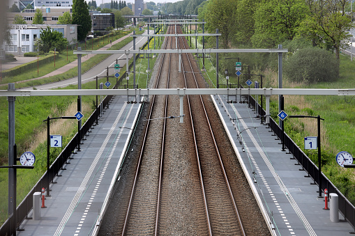 Railroad track and platforms of Lansingerland Zoetermeer Railway Station in the Netherlands