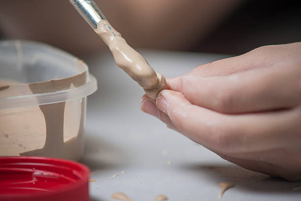 istock Girl make toyfrom clay 186189501