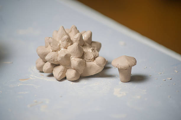 istock Girl make toyfrom clay 186189550