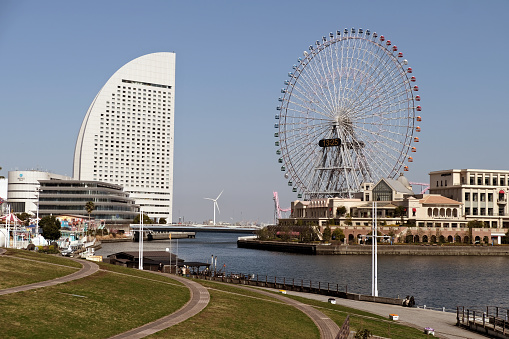 Large Ferris wheel in Minato Mirai, the central business district of Yokohama, overlooking Tokyo Bay, Japan.
