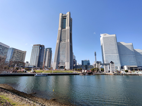 The iconic Landmark Tower, height 296.3 mt and Minato Mirai 21 skyline, the central business district of Yokohama, overlooking Tokyo Bay, Japan.