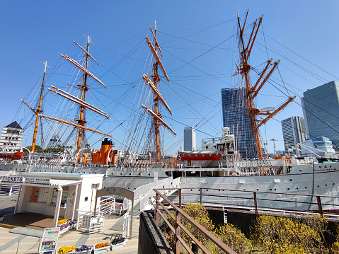 View of Nippon Maru, a Japanese museum ship and former training vessel, permanently docked in Yokohama harbor, in Nippon Maru Memorial Park.