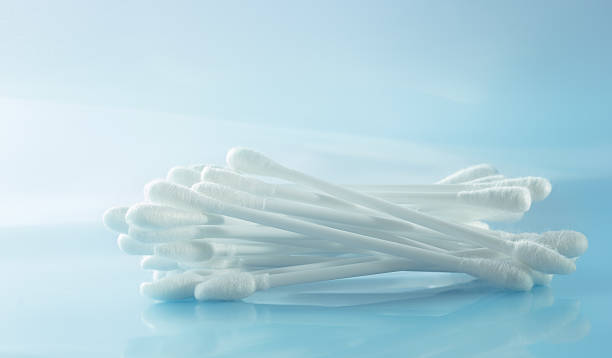 istock group of cotton bud on light blue background. 186192478