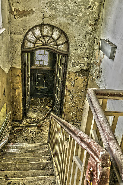 istock Stairway in an abandoned and ruined building 186193342