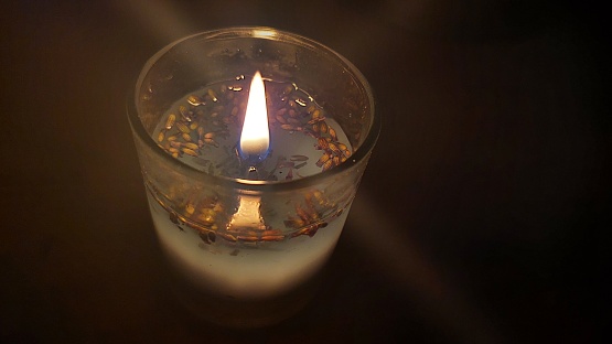 aesthetic candle in glass with aromatherapy