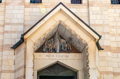 Nazareth, Israel, September 17, 2023 : Religious scene as decoration for the exit from the upper floor of the Church of the Annunciation in the Nazareth city in northern Israel