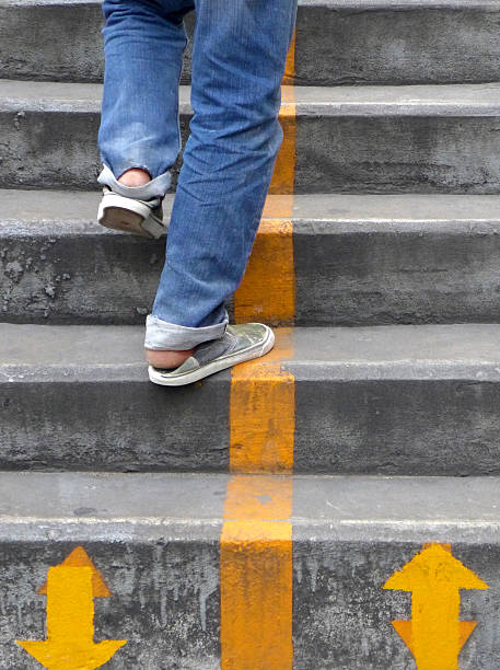istock Walking up the stairs 186196517