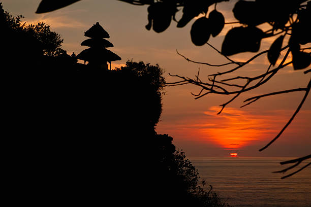 Silhouette Old Uluwatu Temple. stock photo