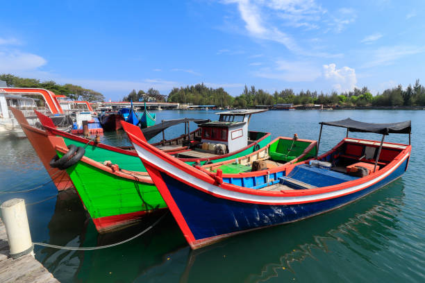 istock Aceh traditional boat was parked at Ulee Lheue beach, Aceh 1861981621