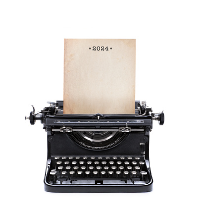 Year 2024 on a sheet of typewriter paper
