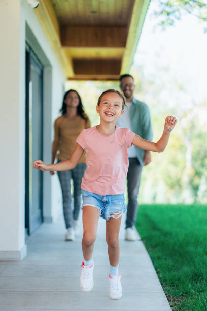 istock Happy little girl running 1862038288