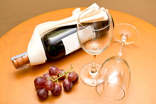 istock red wine with glass on the table 186209943