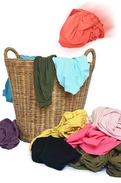 istock Toss shirt in wicker basket 186210086