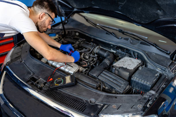 istock A Mechanic Man is Checking the Electricity in a Car Using an Equipment. 1862104876