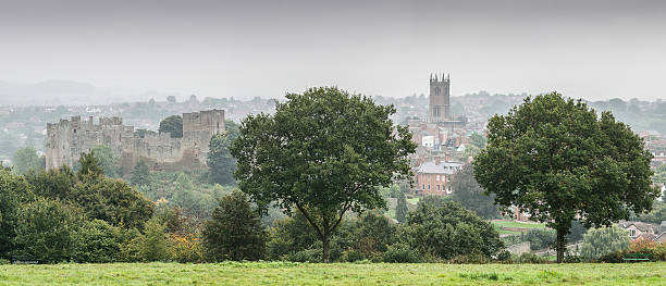 Panorama of Ludlow on a misty day Panorama image of Ludlow on a misty day.  Includes Ludlow castle and Ludlow church. ludlow shropshire stock pictures, royalty-free photos & images