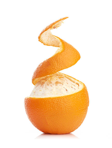 istock orange with peeled spiral skin 186213100