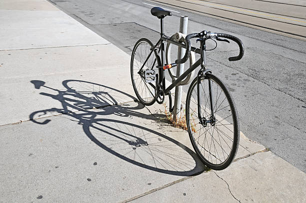 istock Bicycle locked up on the street in Toronto 186213499