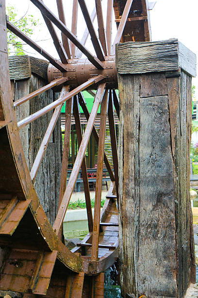 istock Wooden gear wheel in old windmill 186214756