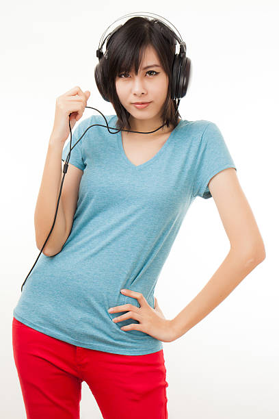 istock asian couple and headphones 186215024