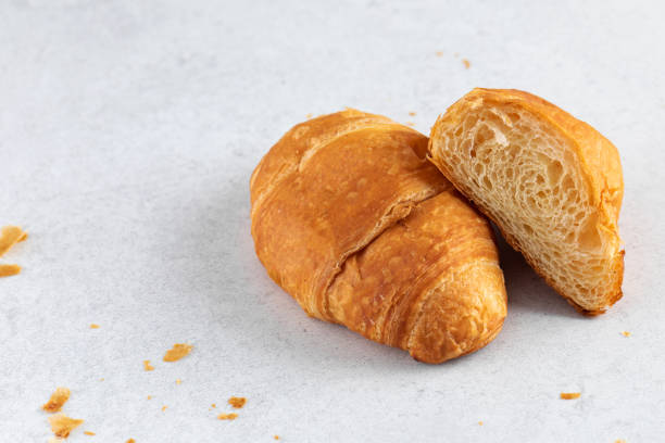 istock Fresh croissants on a grey background. French breakfast. Copy space 1862150919