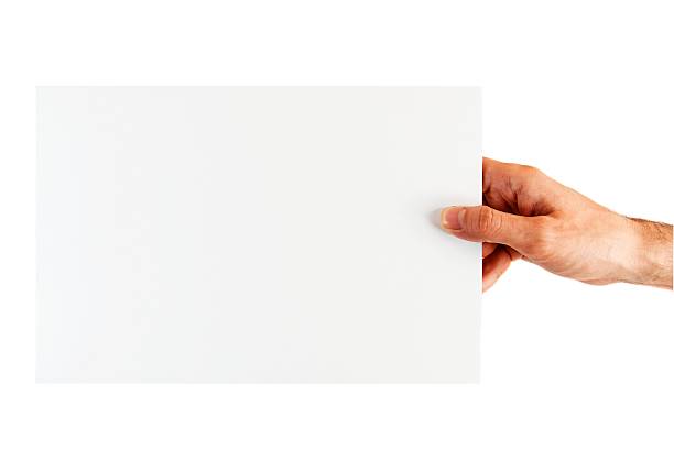 istock Male hand holding blank paper sheet, isolated on white 186217780